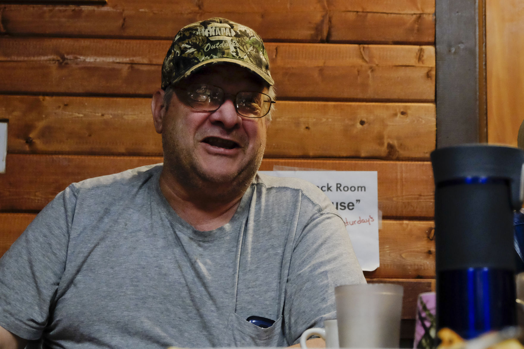 Curtis Spatzierats discusses the recent primary election Thursday at the Mint Cafe in Townsend.